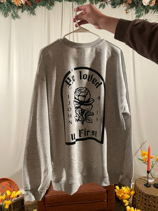 He First Loved Us Crewneck Black - Unisex